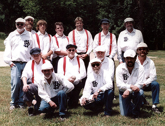 A nice portrait of the combined teams of the Echoes and the Friends N Faith Cherry Pits from Eau Claire. These two clubs have been playing each other and exchanging players for 4 seasons and 3 years at the Eau Claire Cherry Festival, where this portrait was taken.
