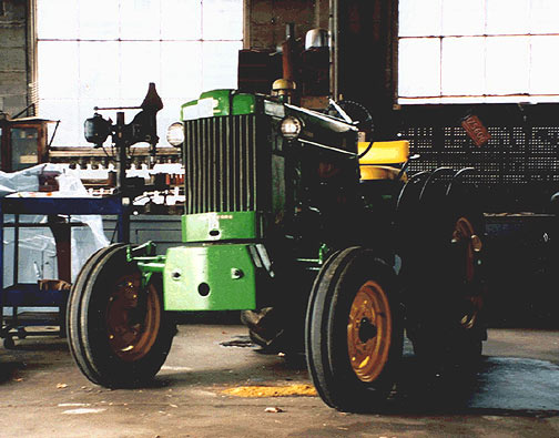 1930 mechanics garage still in service today. 1940s John Deere tractor with nearby 1920s drill press.
