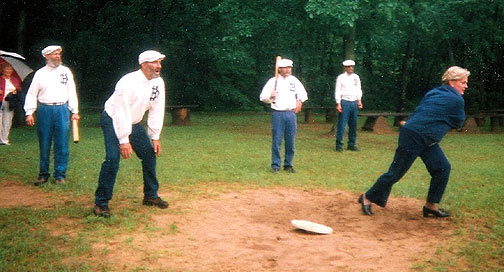 Michigan Governor, Jennifer Granholm, visits Mary's City of David on her 'Hidden Treasures of Michigan' tour, June 10, 2004. She told 'Captain' Taylor in Lansing, her batting average wasn't so hot, but she could run. Here she is connecting with the ball down to first base. So lightning fast is the Governor that she didn't bother to beat the ball to first. Actually, quite humble and lotsa pzazz...
