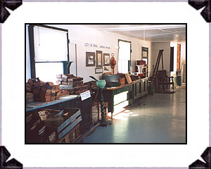 View down the exhibits in the old selling area of the 1935 green house.