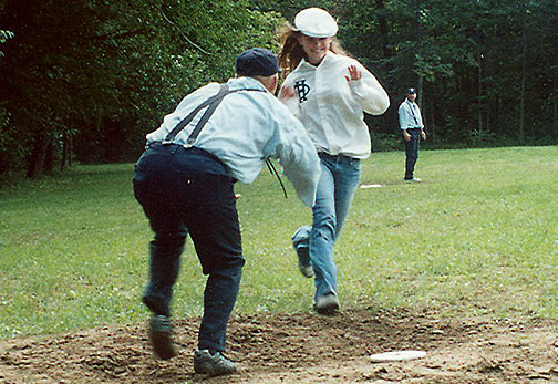 Miss Blossomtime, Jamie Hartmann, of Watervliet, was an All-Star soft ball player for her school during her senior year of 2006. She honored the House of David by coming out to play on the team for its last home match of the 2006 season. Jamie hit well, hurled several innings, played second base and center field. Here she is tagged before she reaches home base, which would have been the tying tally for the Echoes. It was an exciting match till the last out, in which the Echoes came up one tally shy.