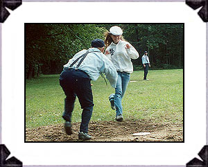 Miss Blossomtime, Jamie Hartmann, of Watervliet, was an All-Star soft ball player for her school during her senior year of 2006. She honored the House of David by coming out to play on the team for its last home match of the 2006 season. Jamie hit well, hurled several innings, played second base and center field. Here she is tagged before she reaches home base, which would have been the tying tally for the Echoes. It was an exciting match till the last out, in which the Echoes came up one tally shy.