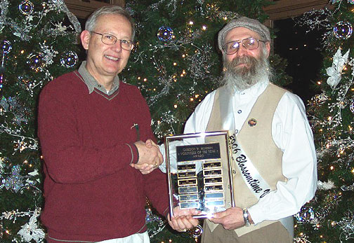 This year the award was presented to Ron Taylor for his many hours volunteering this past year. Ron has been a volunteer for Blossomtime for many years in arranging and hosting the House of David Echoes Base Ball Club in the Grand Floral Parade and the vintage baseball games with the Blossom Queens after the blessing of the blossoms and during fair week in August.