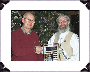 This year the award was presented to Ron Taylor for his many hours volunteering this past year. Ron has been a volunteer for Blossomtime for many years in arranging and hosting the House of David Echoes Base Ball Club in the Grand Floral Parade and the vintage baseball games with the Blossom Queens after the blessing of the blossoms and during fair week in August.