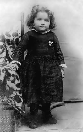Hettie Purnell as a child. Hettie would die a tragic death several weeks after her 16th birthday, in Fostoria, Ohio. Just several weeks ahead of their departure date for a new home in Benton Harbor, Michigan, the death of their daughter brought a solemn trying hour to the joy of their intended plans in journeying to Benton Harbor, and a final established base for their new-born church. Hettie died on her first day at work in a fire works factory in Fostoria. An explosion and subsequent fire destroyed the structure, killing all inside.